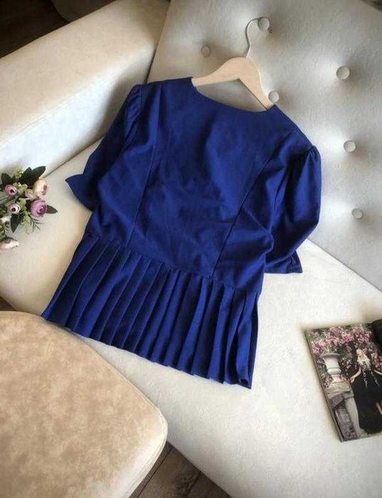 Елегантна блузка-жакет з баскою