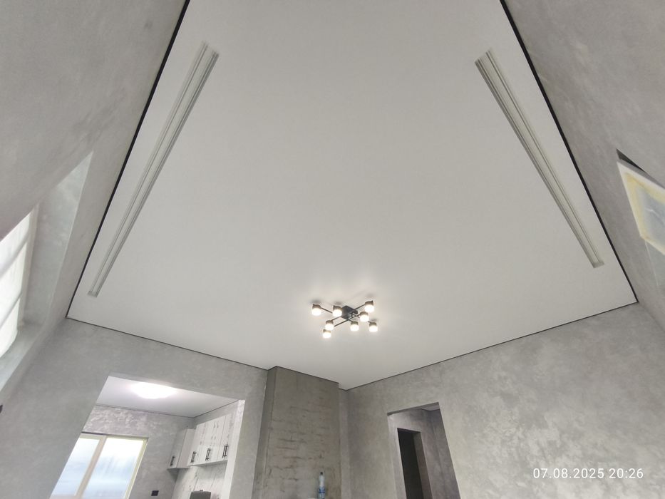 Натяжні стелі потолки