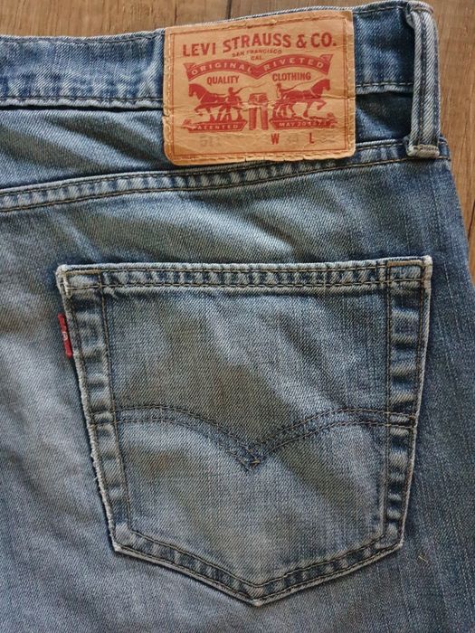 Levis 511 Przylegające SPODNIE JEANS przecierany niebieski - W34/L32
