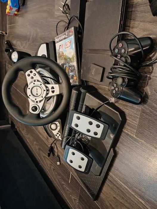 Zestaw konsoli PS2 i kieownicy cena do negocjacji
