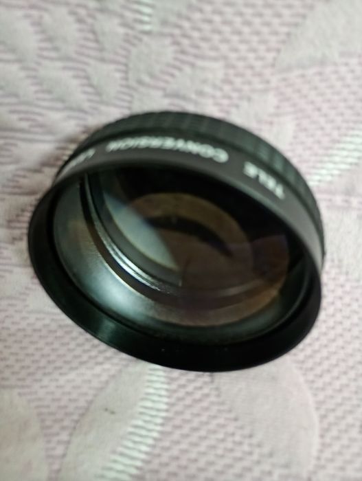 Teleconversor usado em câmera de Video