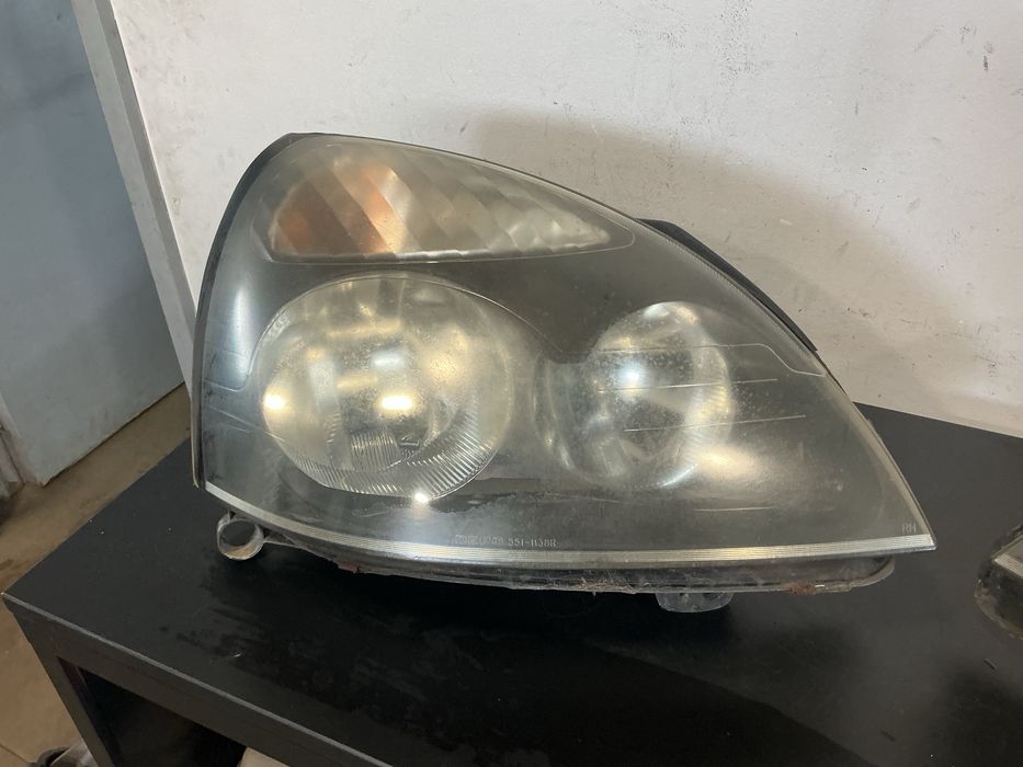 Farol /ótica Renault Clio II Ano Fundo escuro