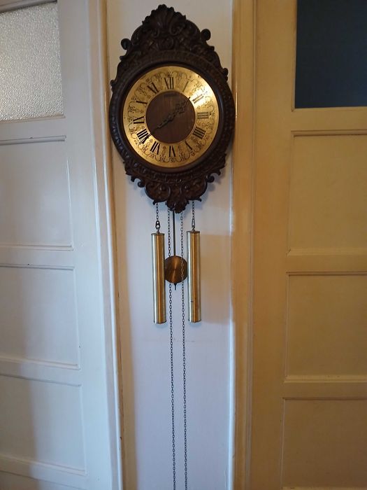 Relógio de pesos e pêndulo