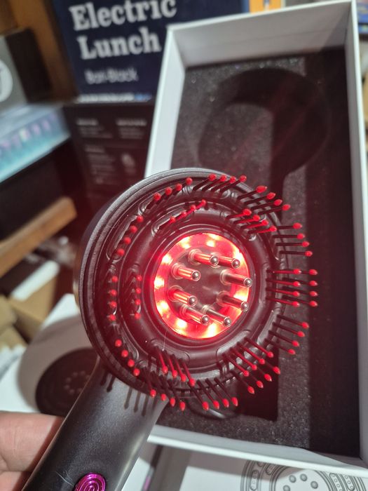 Масажер - гребінець для волосся .