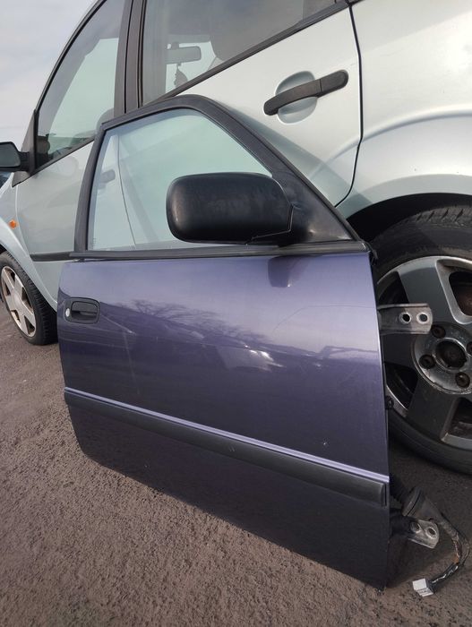 Toyota Corolla E11 1.4i 5D 1998r. Lusterko zewnętrzne prawe.