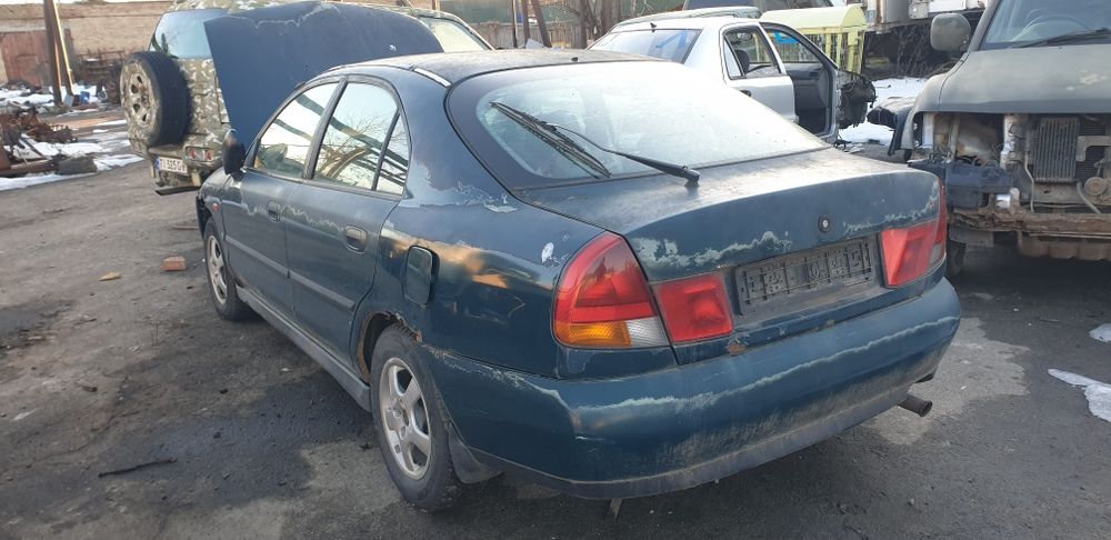 Митсубиши каризма 1.8 шрот