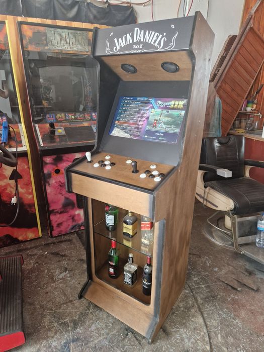 Máquina de jogos, Arcades