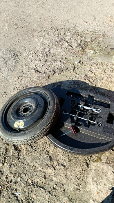 Koło zapasowe Toyota Corolla e21