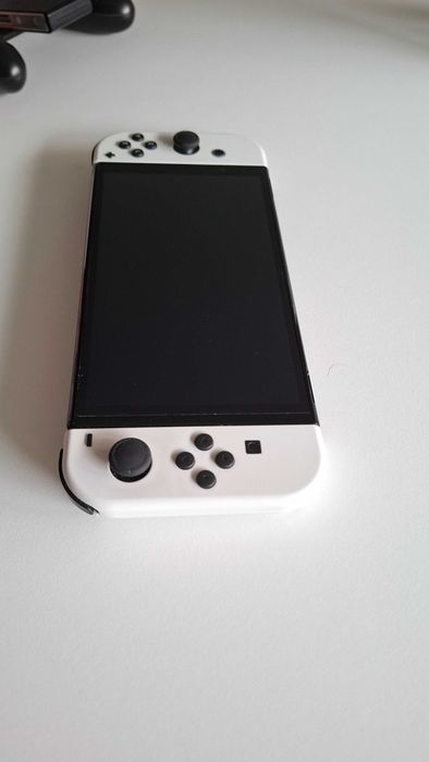 Switch OLED (Como novo)64741329254786122
