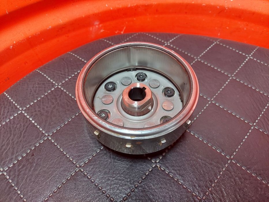 ORYGINAŁ Magneto Honda CBR 125 koło zamachowe magnesowe generator prądnica iskrownik alternator