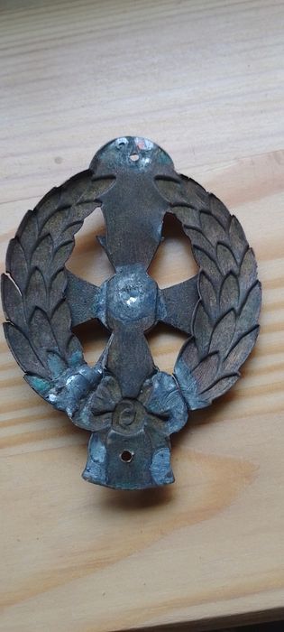 Jakaś stara odznaka 10 lat służby .