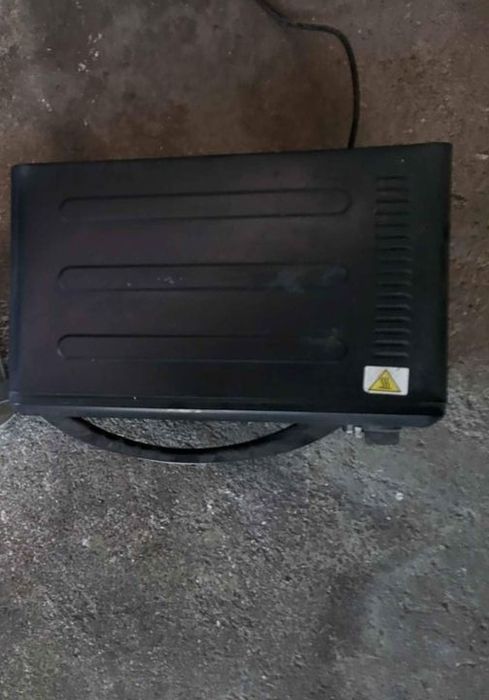 Forno eletrico a funcionar