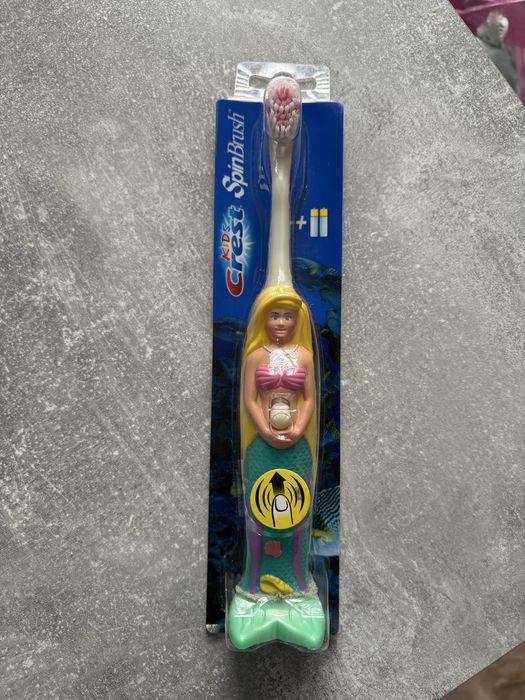 Дитяча електрична зубна щітка