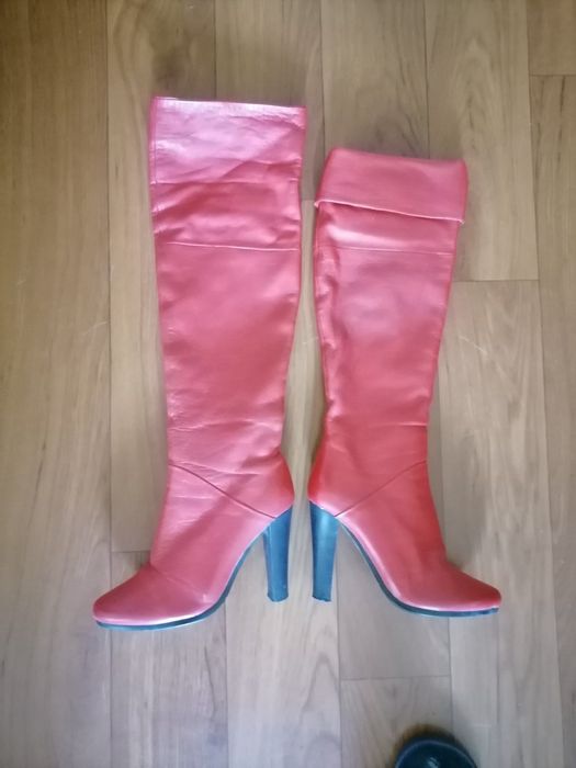 Шкіряні ботфорти .