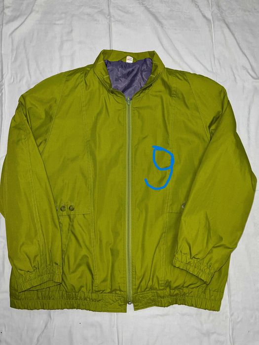 Вітровка зелена жіноча