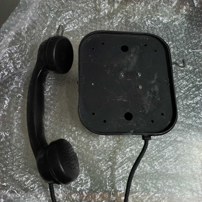 Telefone antigo de parede
