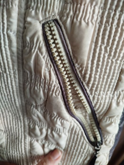 Жіночі теплі жилети б/у