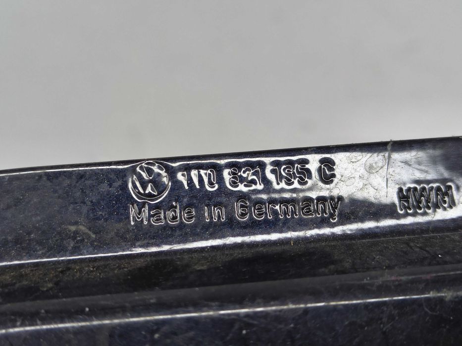 Wspornik mocowanie błotnika lewe przód VW Touran II 1T3 1T0821135C