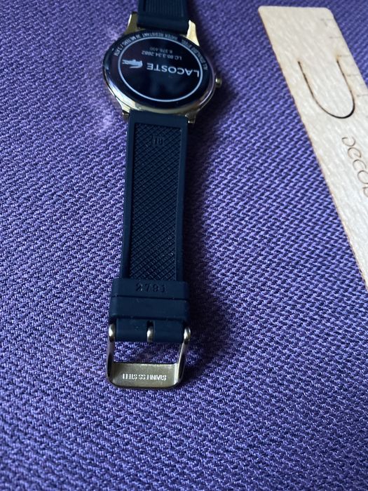 Zegarek Lacoste w kolorze złotym i czarnym paskiem