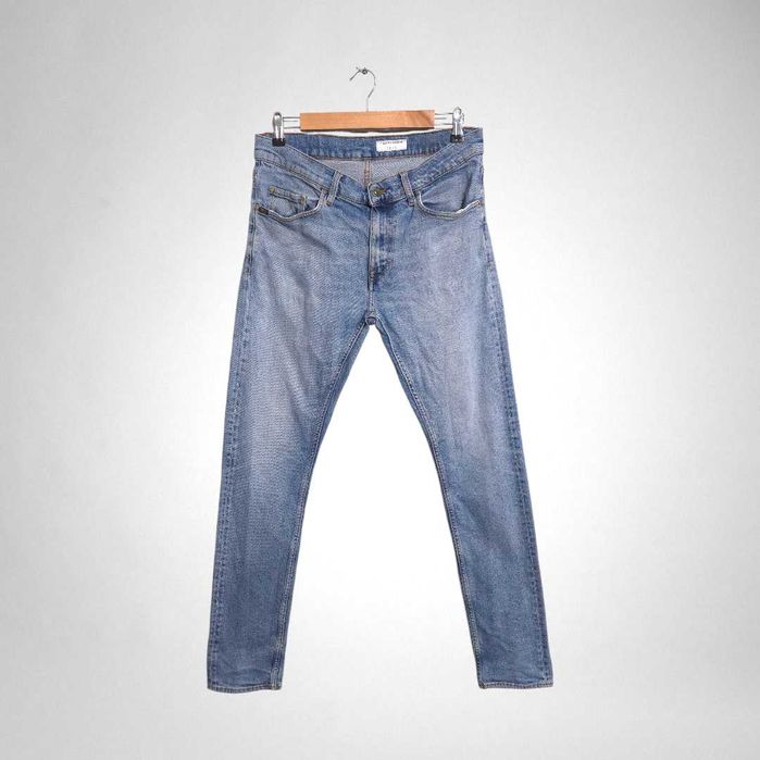 Niebieskie spodnie jeansy elastyczne męskie slim fit taper Tiger of Sweden Pistolero W30 L34