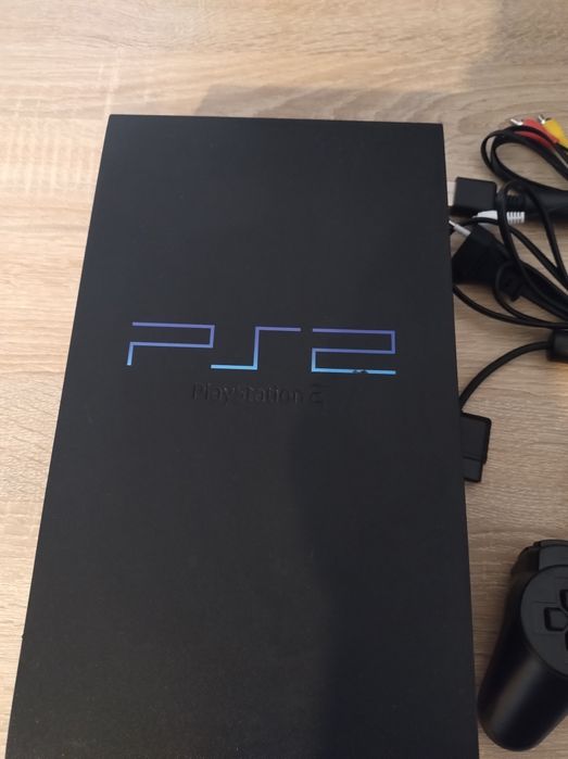 PlayStation 2 Slim + Pad + Kable