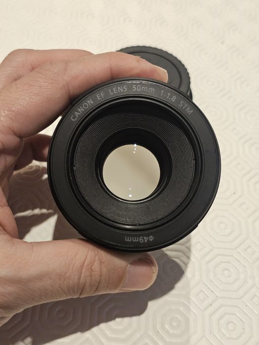 Canon ef 50mm f 1.8 igual a nova