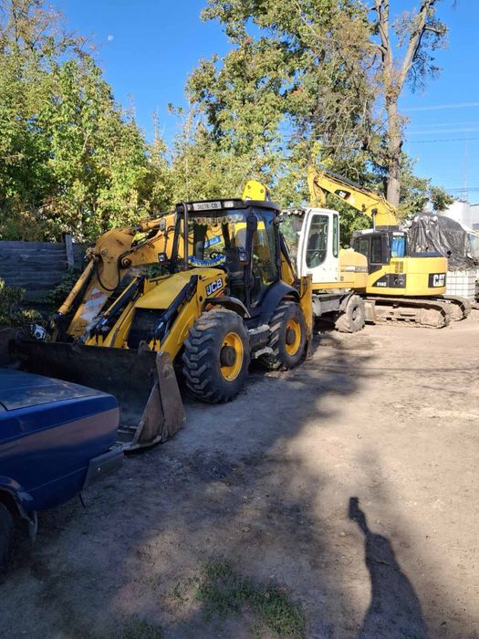 Послуги екскаватора навантажувача та повноповоротного