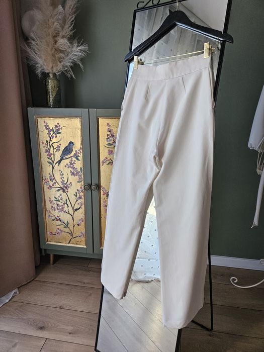 Eleganckie kremowe spodnie damskie H&M proste nogawki wysoki stan XS ś