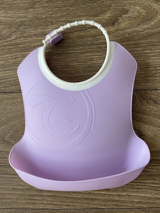 Śliniak twistshake plastikowy z kieszonką