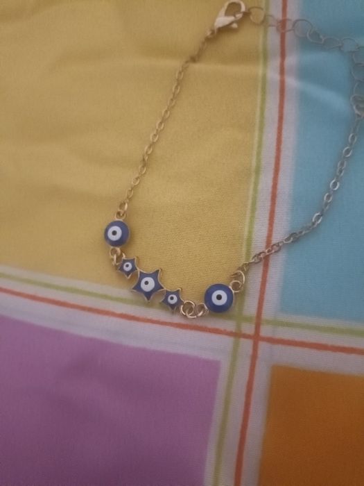 Pulseira com olho mau olhado com estrelas cor azul
