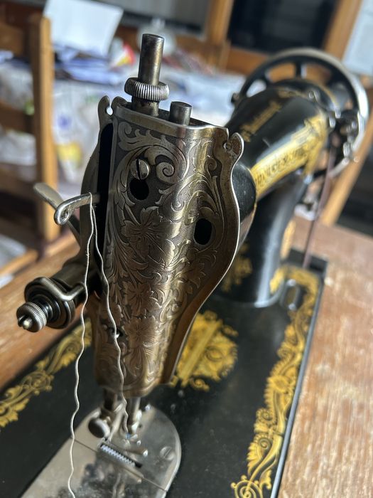 Máquina e costura Singer com manual e acessórios
