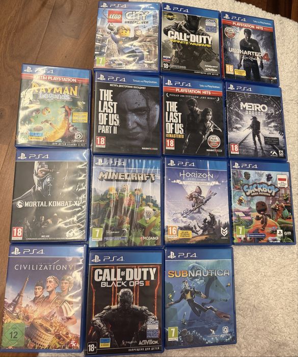 Ігри на приставку ps 4( б/у) ціна за всі разом ( 14 штук)