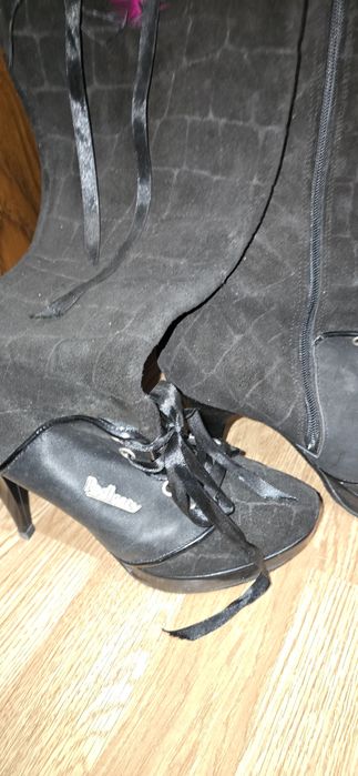 Botas de marca em pele