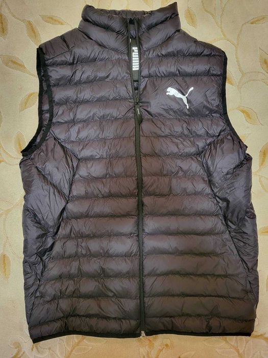Оригінальний жилет чоловічий Puma PrimaLoft  майже нова.