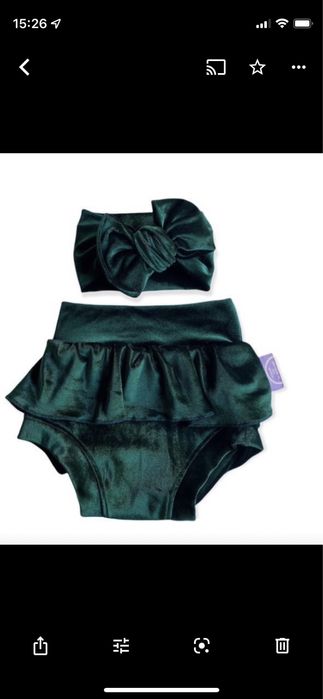 Tapa fraldas e fita verde