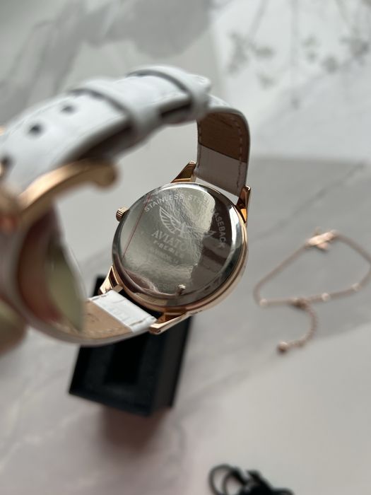 Zegarek damski Aviator z bransoletką samolot biały złoty komplet