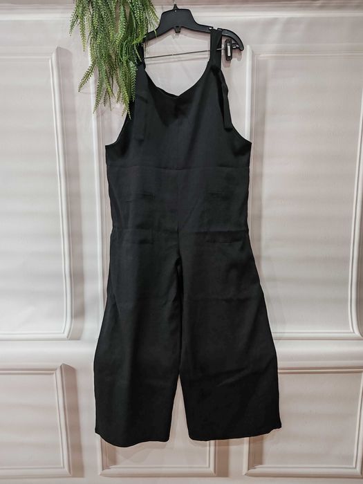 Czarny wygodny długi kombinzon rozmiar ok 44 poliester/spandex