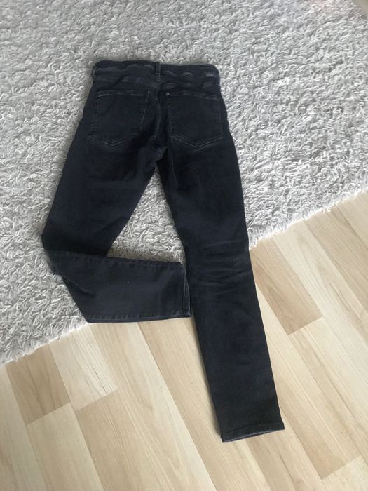 Jeansy  damskie, czarne z rozdarciami r. M z H&M