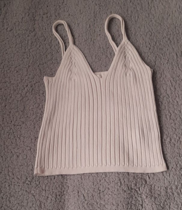 Kremowy top w prążki