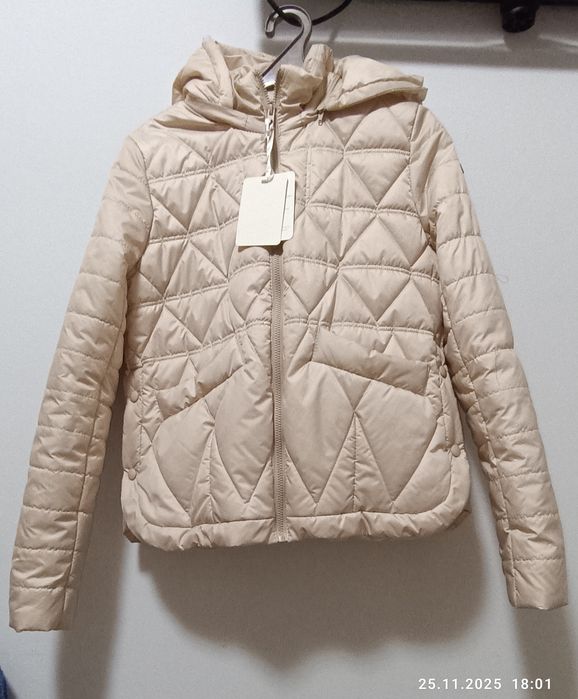 Кутрочки пальто жіночі