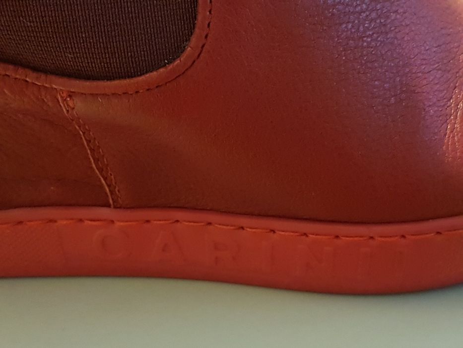 Sneakersy na koturnie jak nowe Carinii skórzane czerwone,  r. 39