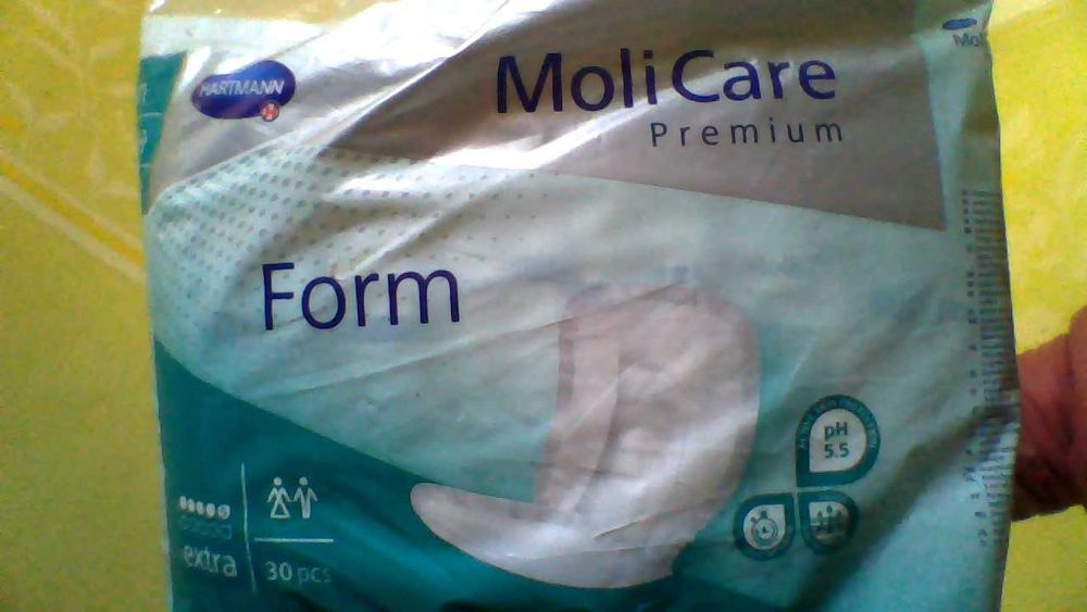 памперси, підгузки та урологічні прокладки для дорослих