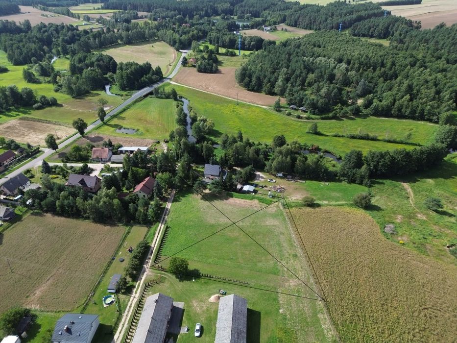 Działka 4000 m² z WZ | Rzeka Wel 100 m | Jezioro 400 m | Ogrodzona