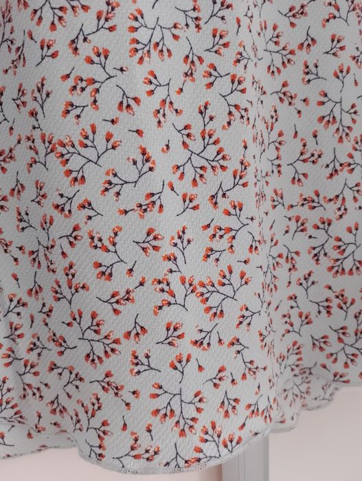 Rozkloszowana błękitna spódnica w kwiatki rozmiar 40/42 Blue motion 
D