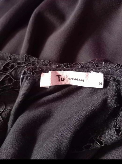 Elegancki czarny kombinezon 36