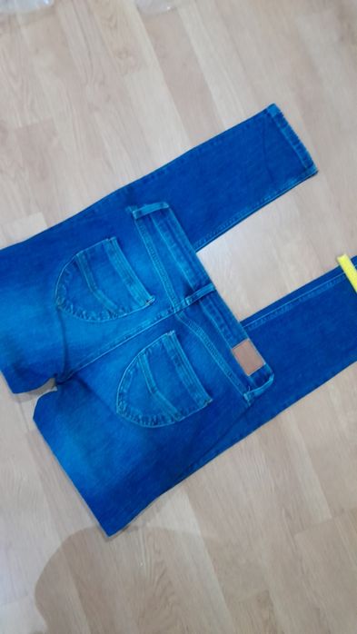 Spodnie Cross Jeans 36