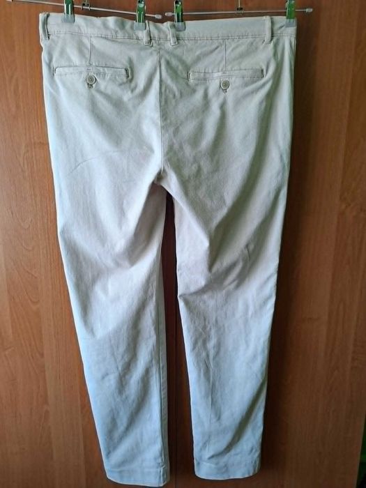 Spodnie męskie jasne SLIM FIT   98% bawełna Reserved