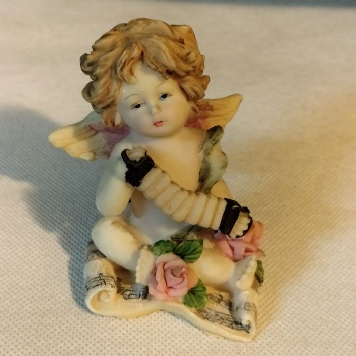 Old resin angels/dolls64585434140801124