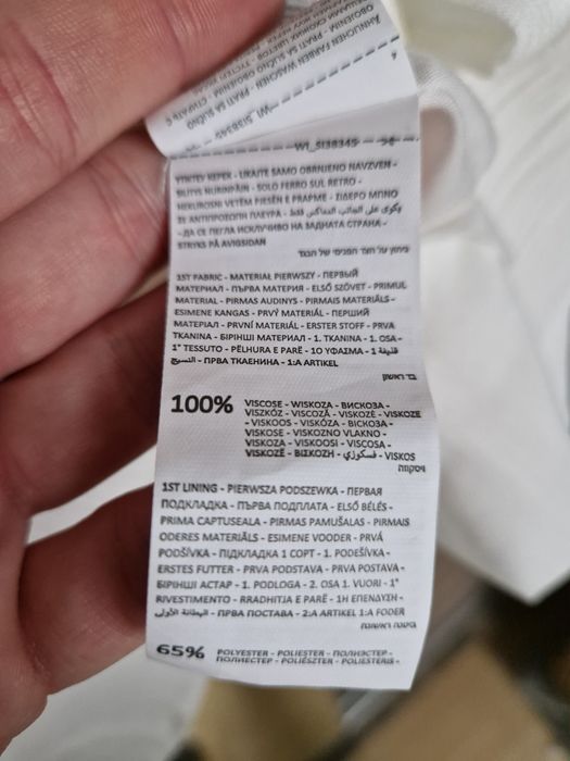 Biała sukienka Sinsay S