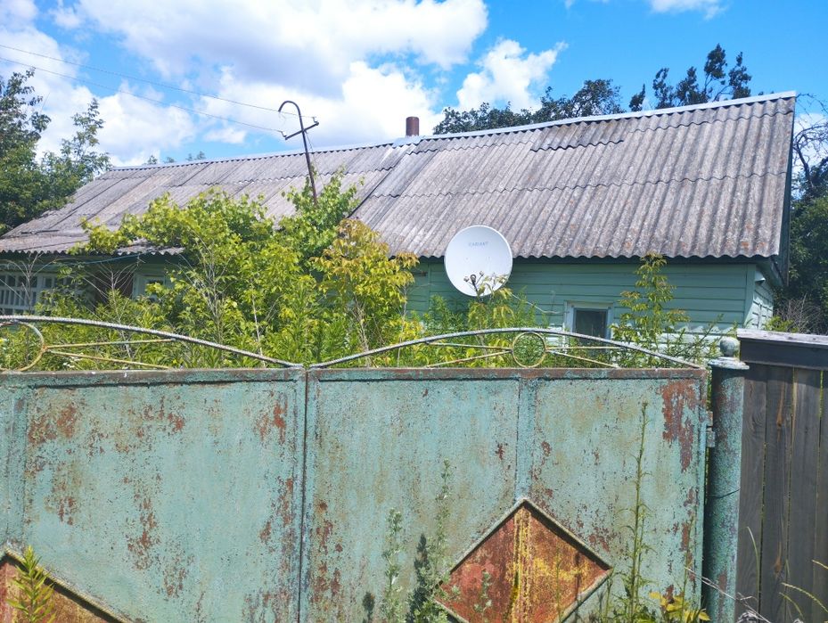 Продам земельну ділянку з будинком